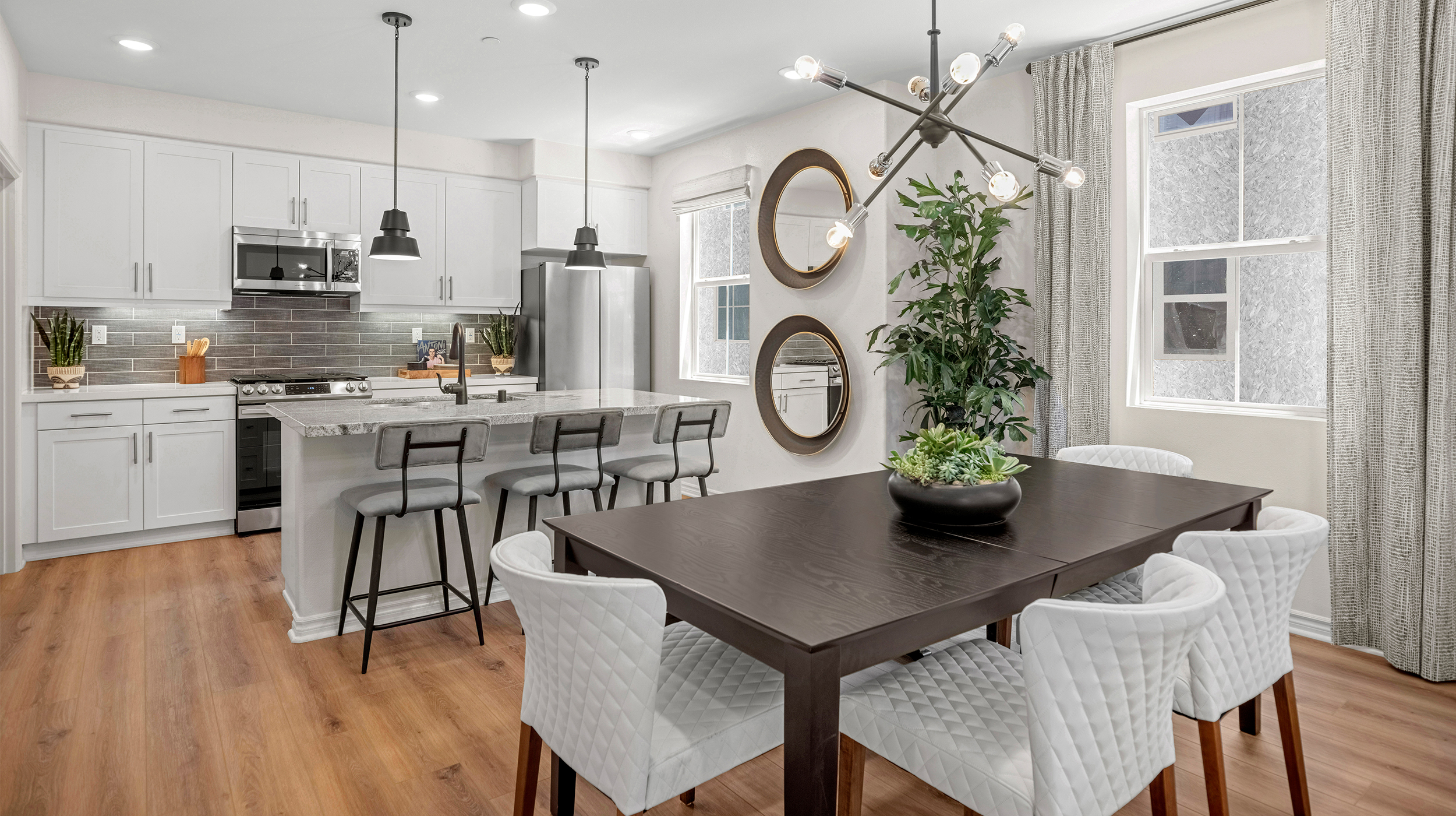 Kitchen and Dining area at Avila by Brandywine Homes