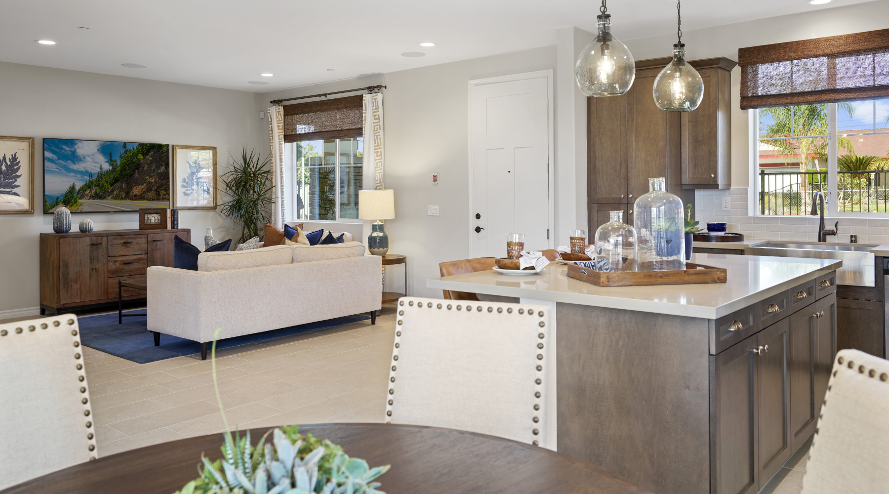 Living, kitchen, and dining areas at Citra by Brandywine Homes